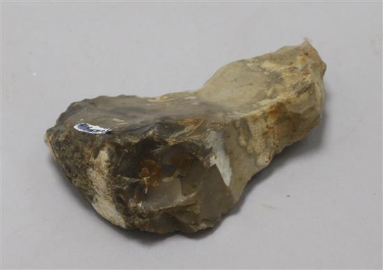 A prehistoric polished grey flint axe head, L 11cm and four other items,